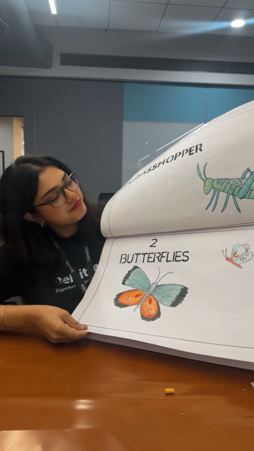 Shweta participating in a Deloitte Impact Day activity